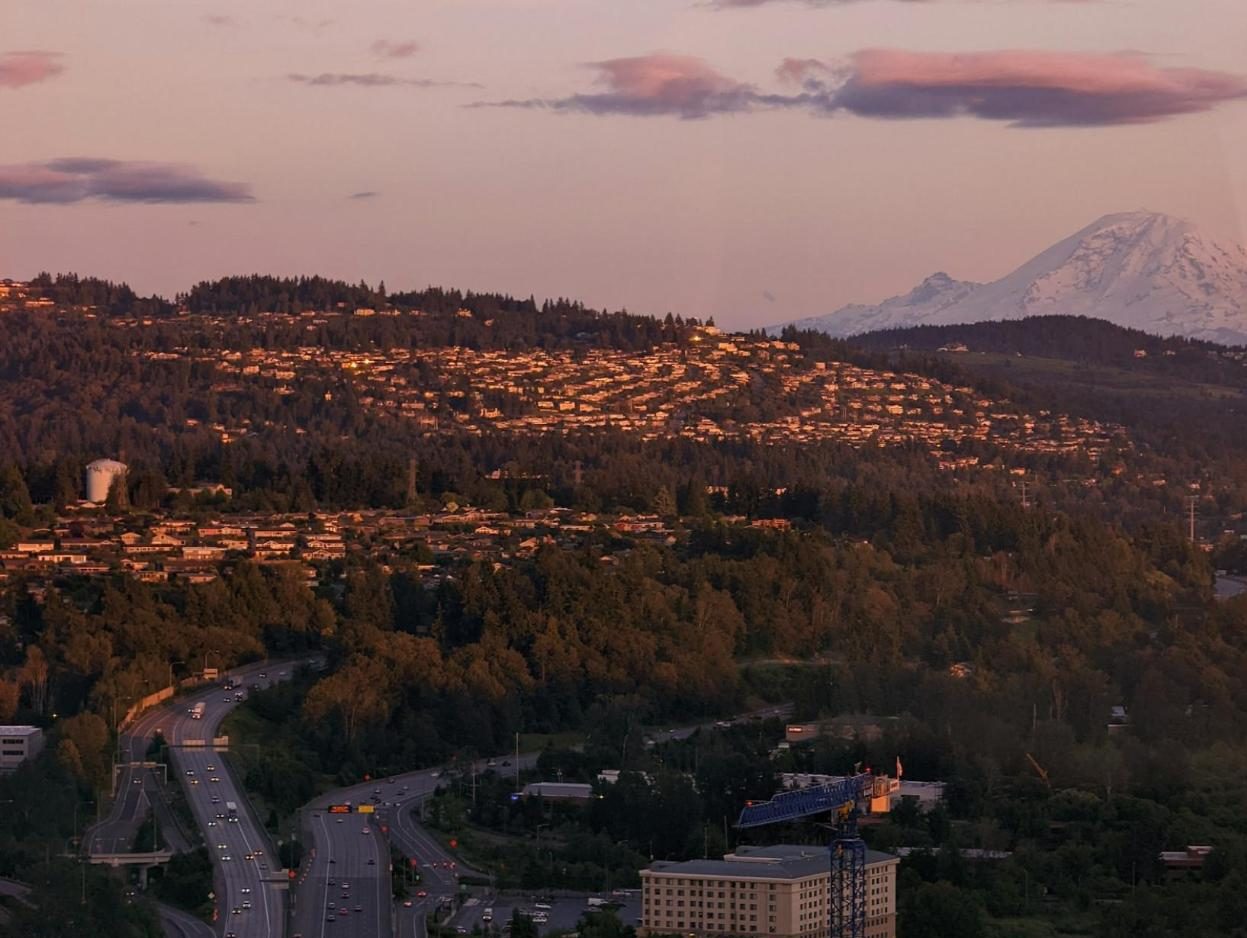 Eastside hills at dusk with Mount Rainier in the distance
