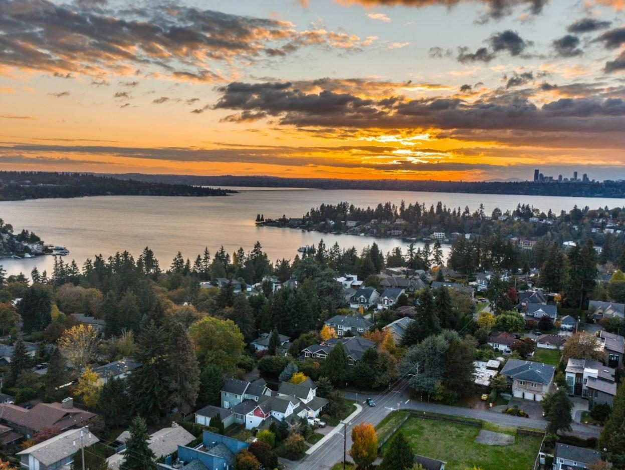 Aerial view of a lakeside neighborhood at sunset